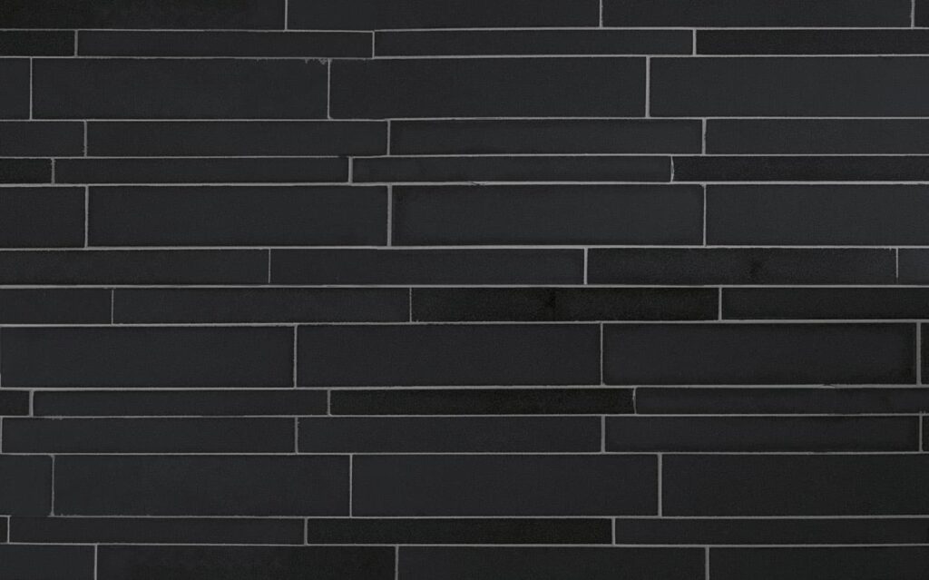 Ebony Basalt Lynia Interlocking | Black Tile Fireplace Wall