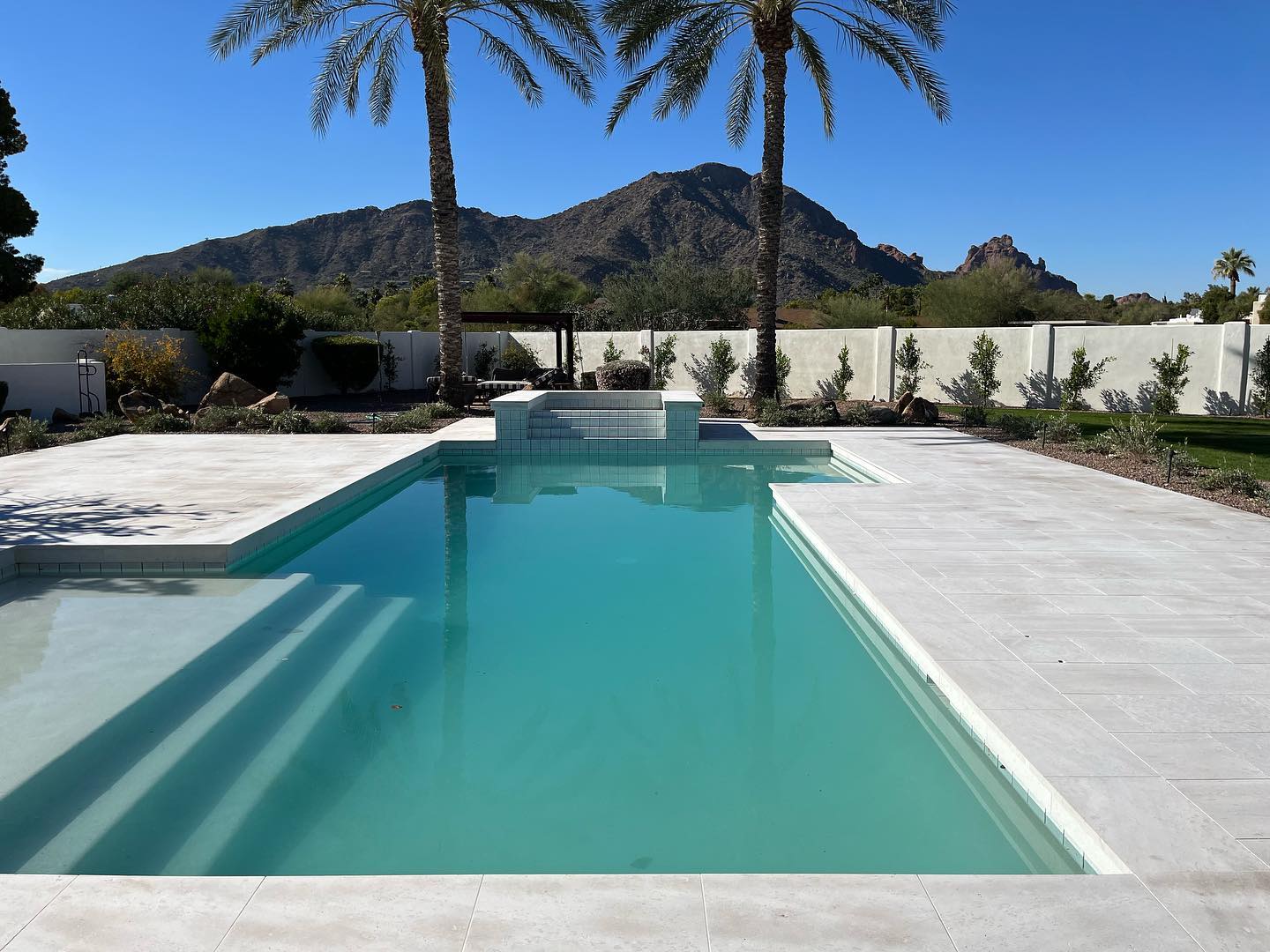 Luna Sandblasted AllClad™ Exterior Limestone Pavers on a Pool Deck