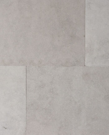 Gaia Cashmere AllClad blue-grey limestone tile with earthy green, taupe, and warm brown undertones.